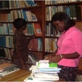 National Service personnel assisting in shelving
