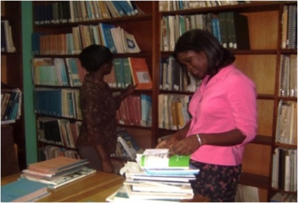 National Service personnel assisting in shelving